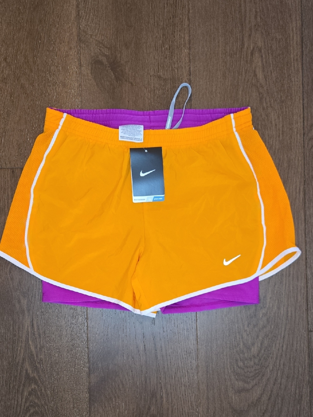 Nike Women's Orange Athletic Layered Shorts with Purple Liner